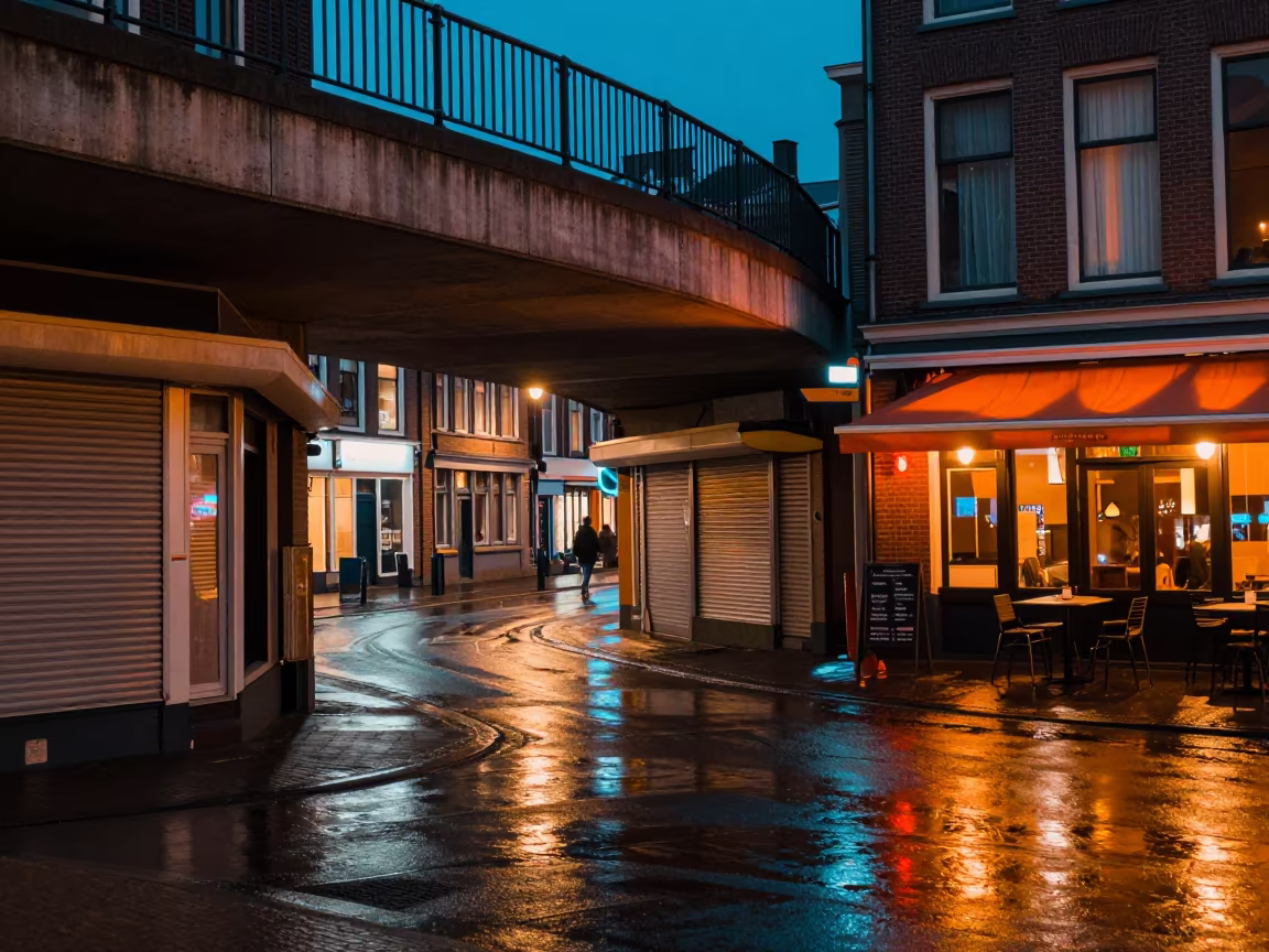 Arnhem Overpass Above Shuttered Shops at Dusk in outside a corner cafe in Arnhem