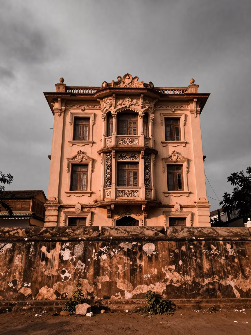 Art Nouveau Facade Beside Thane Fortress Wall in outside a wind-scoured fortress wall in Thane