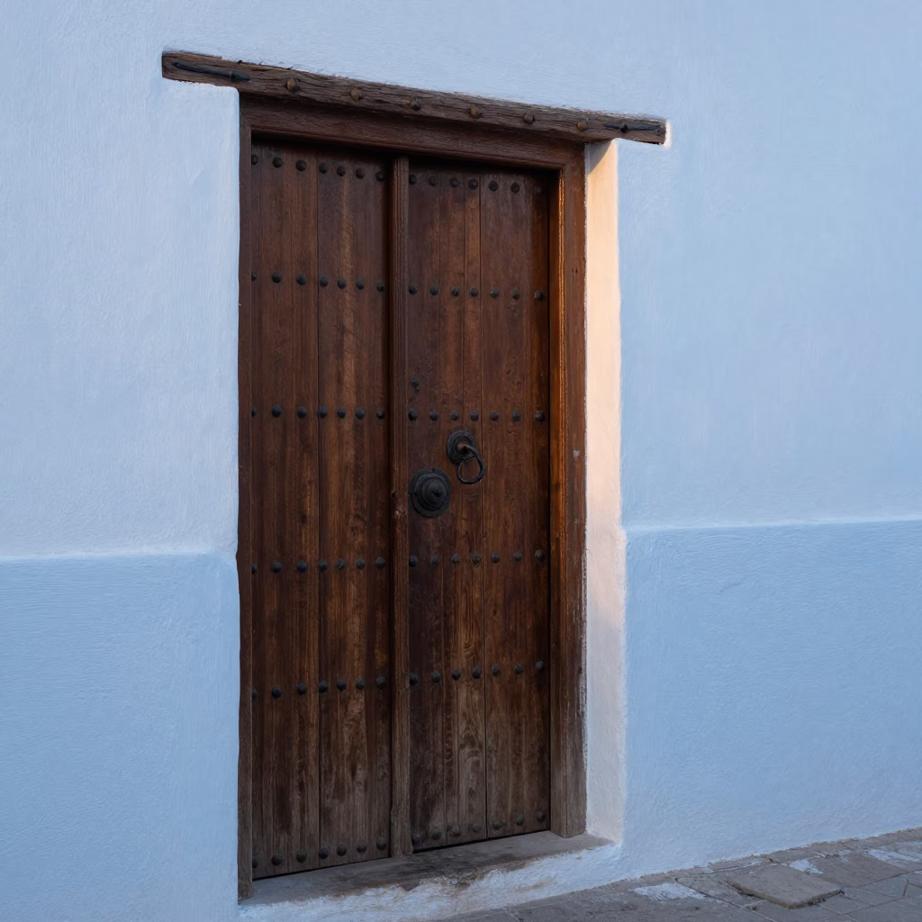 As First Light Reaches The Scene on Wooden Doors in Essaouira in in Essaouira, Morocco