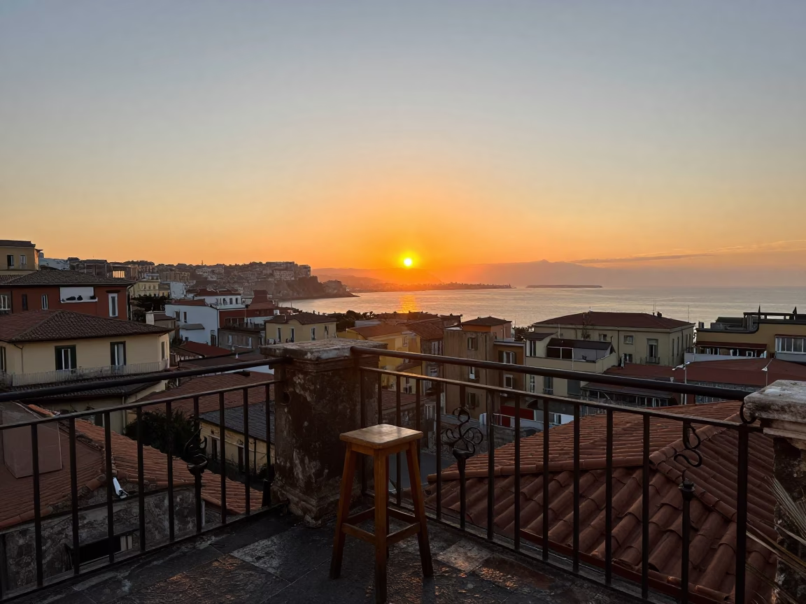 As The Sun Drops Toward The Horizon on Bay in Naples in in Naples, Italy