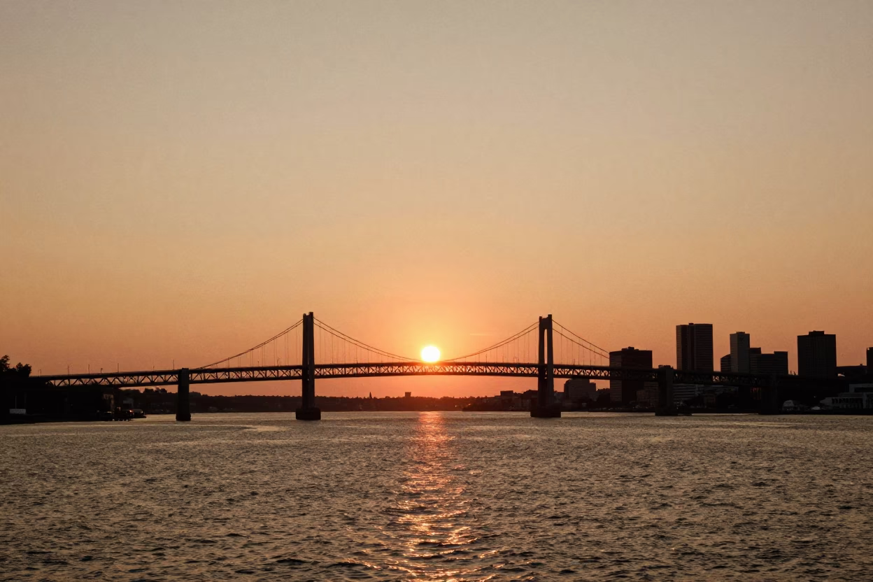 As The Sun Drops Toward The Horizon on Waterfront Sunset in Halifax in in Halifax, Nova Scotia, Canada