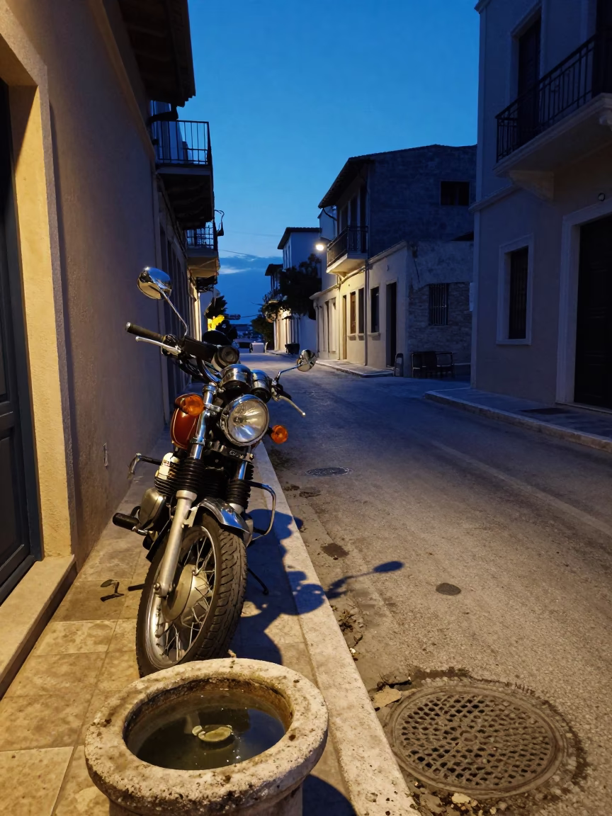 Athens Greece indigo twilight street scene with motorcycle and mezcal glass in in Athens, Greece