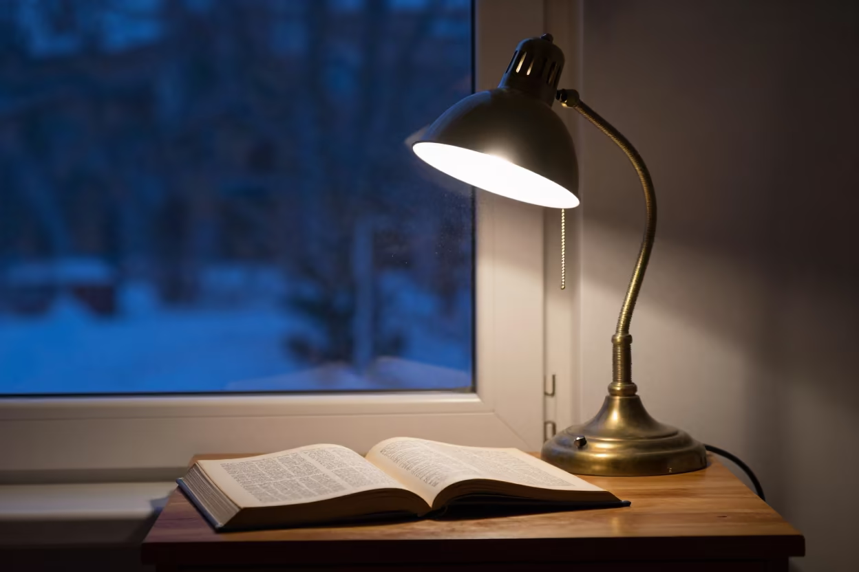 Atlas Under Neon Light on Bedside Table in on a bedside table in Makhachkala