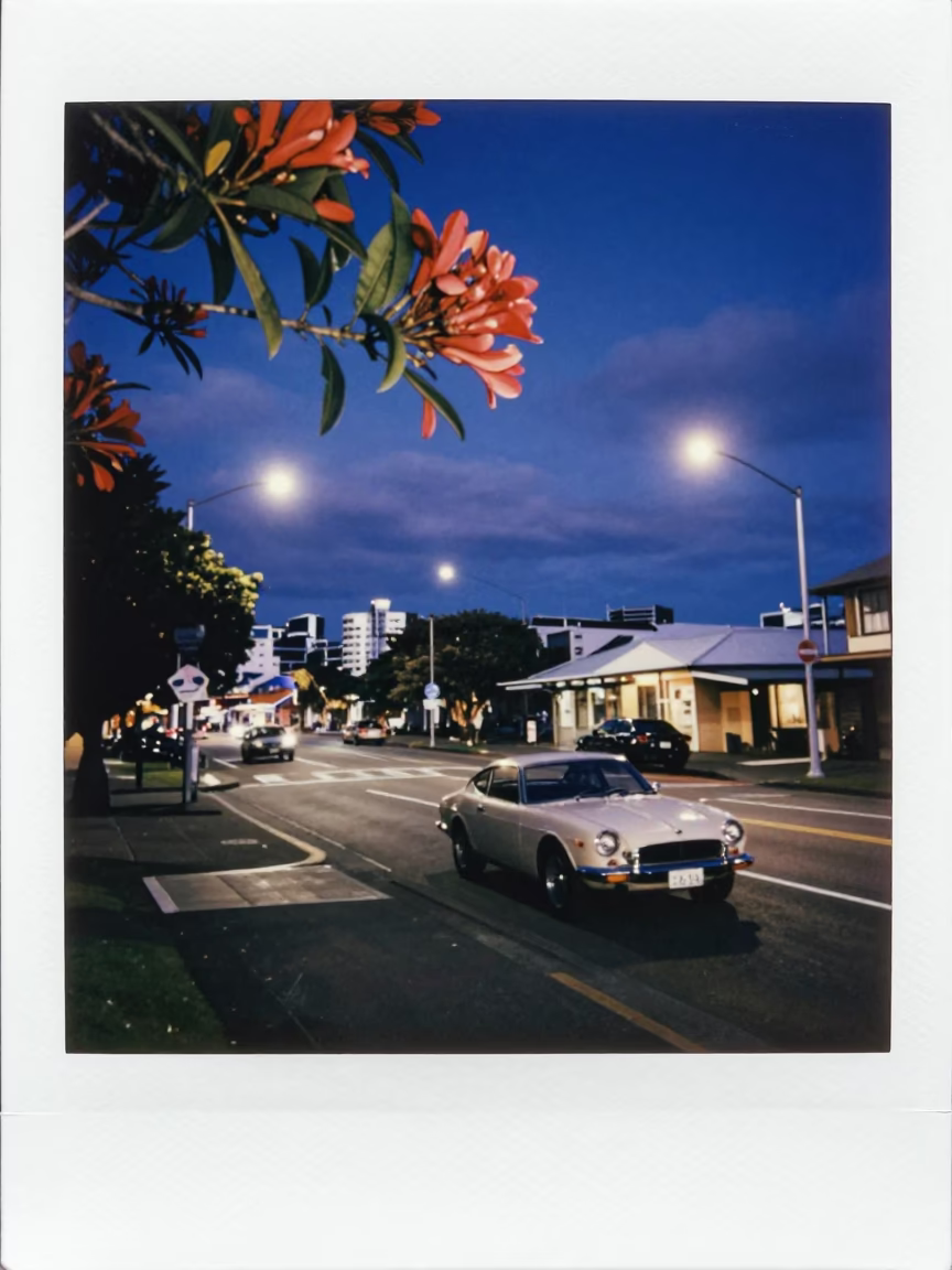 Auckland Blue Hour Street Scene with Frangipani Branch and Vintage Car in in Auckland, New Zealand