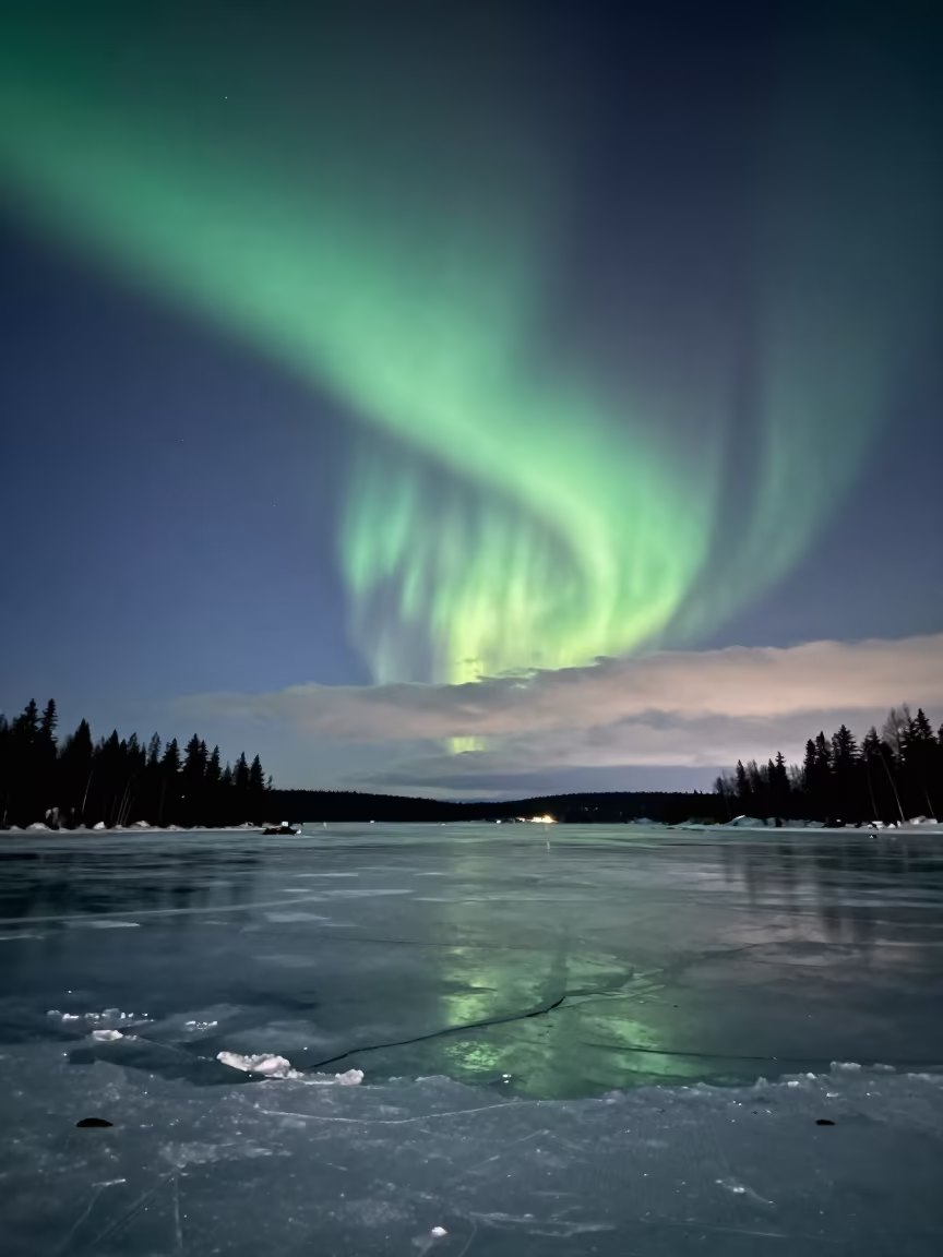 Aurora Waves Over Frozen Lake Before Dawn in near Commercial Drive, Vancouver