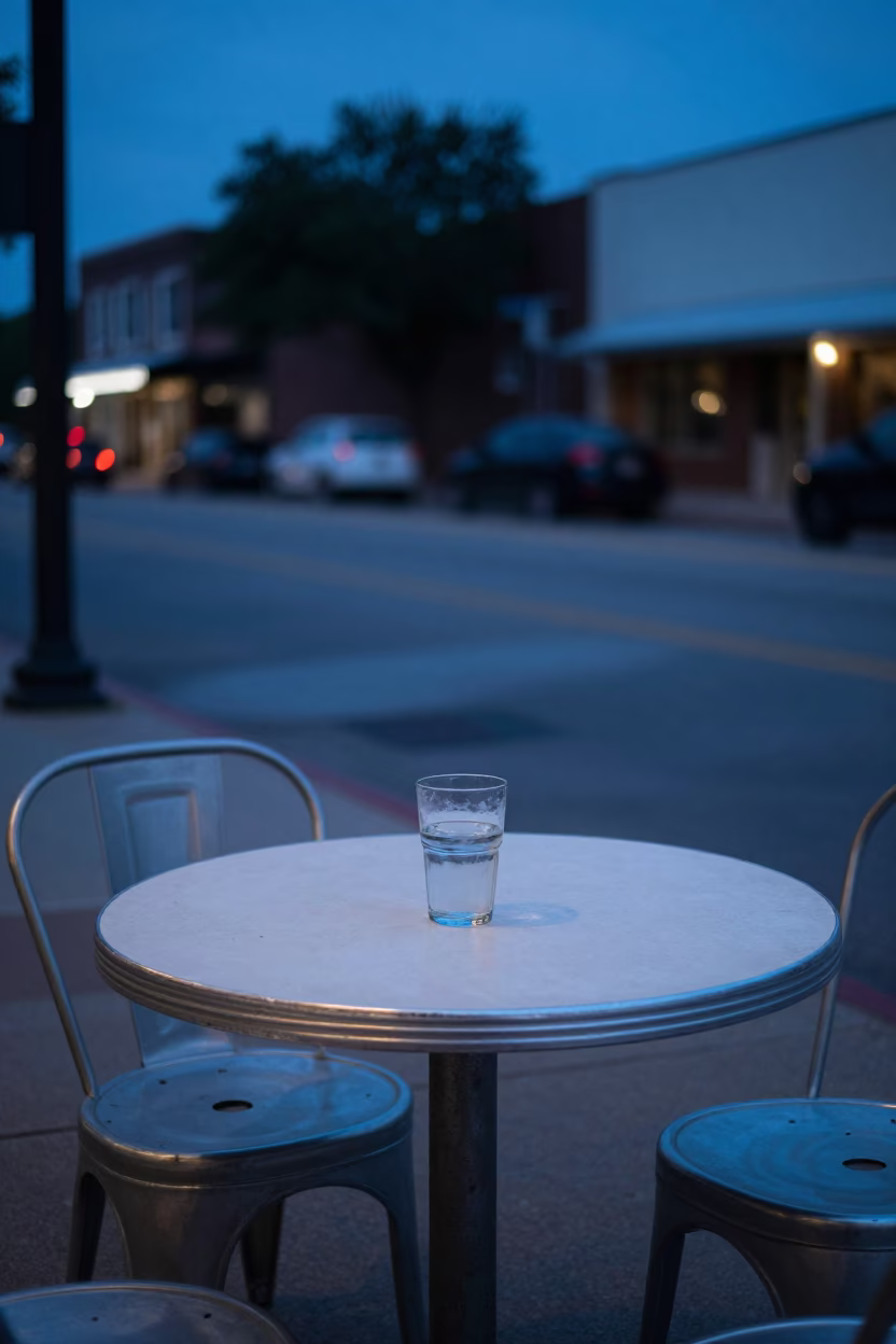 Austin Texas Evening Street Scene with Diner Table and Glass Bottle in in Austin, Texas, United States