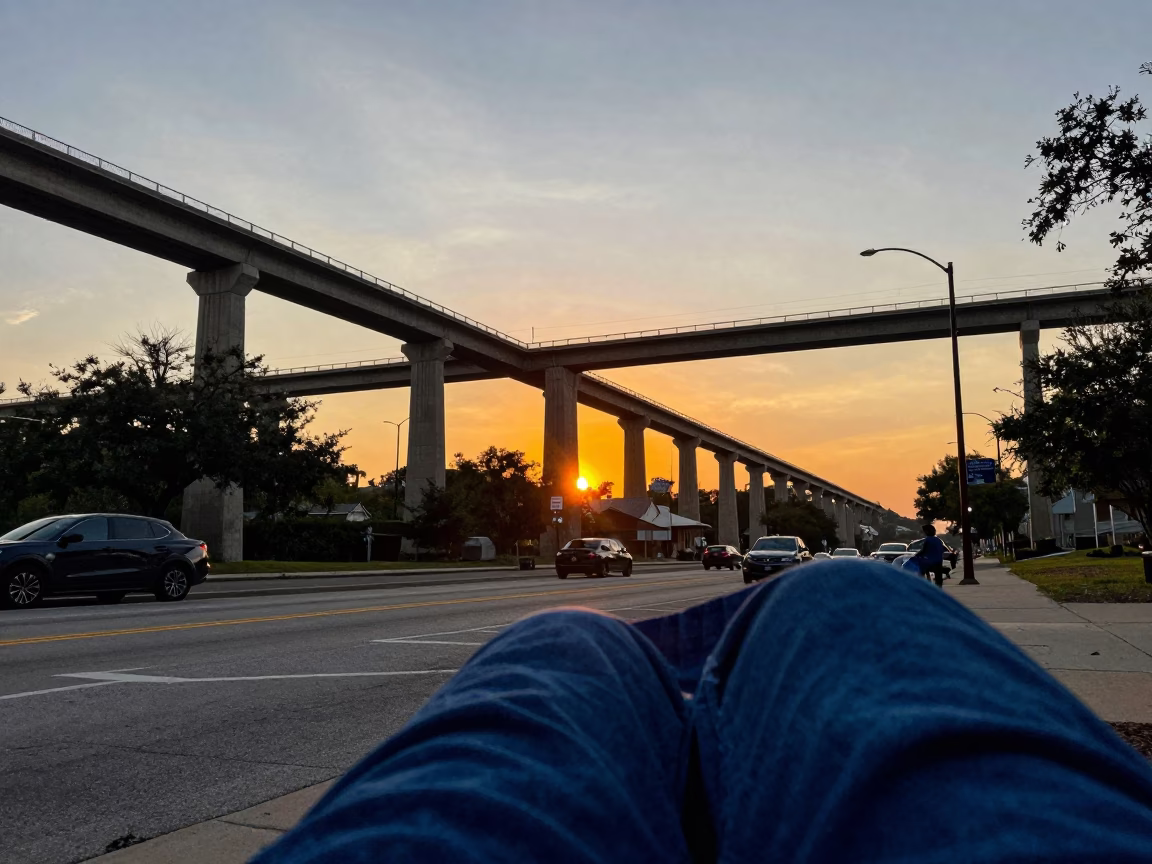 Austin Texas Sunset Street Scene with Dyer Indigo Cloth and Concrete Viaduct in in Austin, Texas, United States