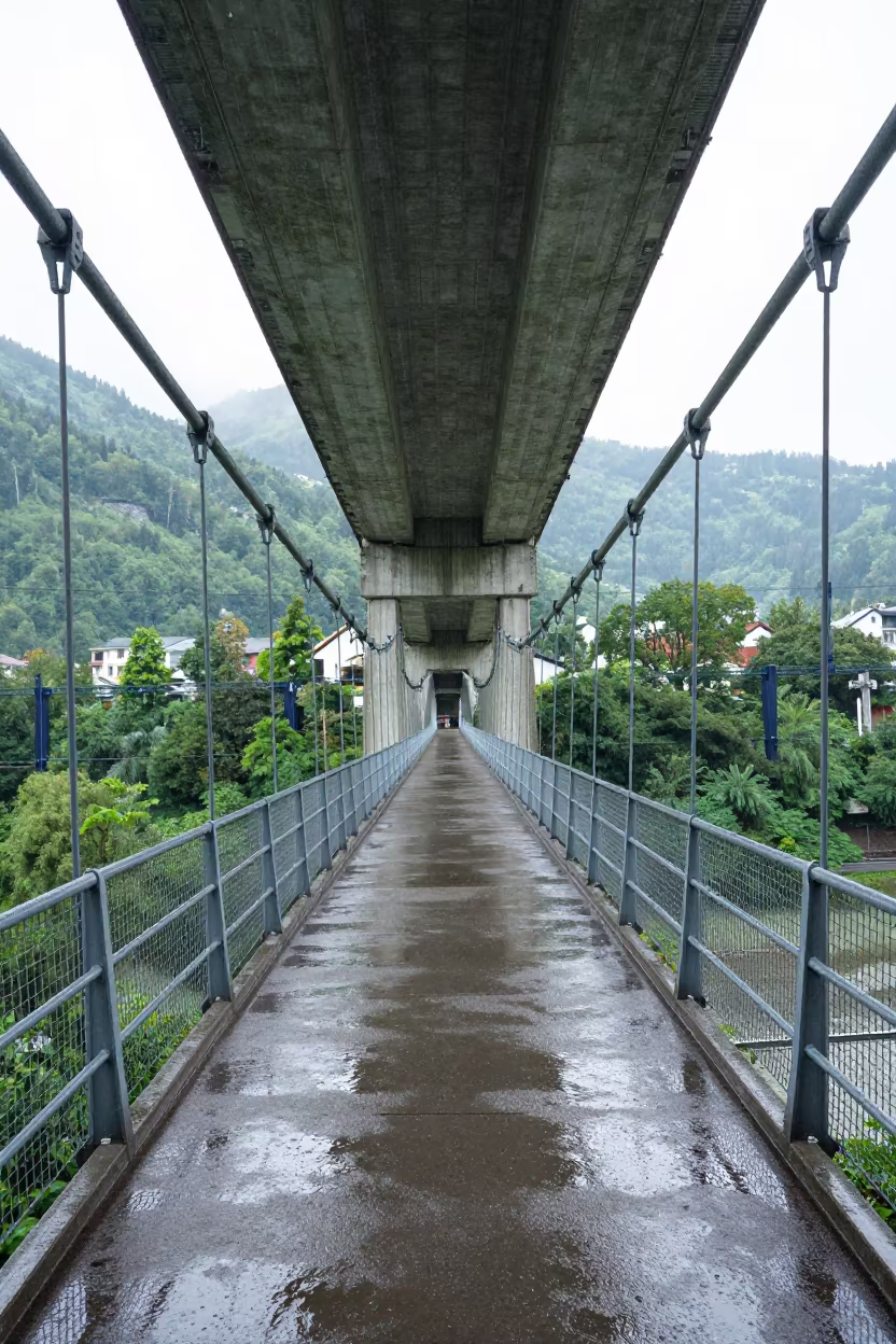 Austrian Suspension Bridge After Storm in under a viaduct of steel and concrete in Austria