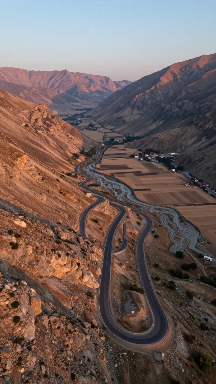 Autumn Mountain Road Aerial View Innsbruck in above dune fields and dry wadis near Innsbruck