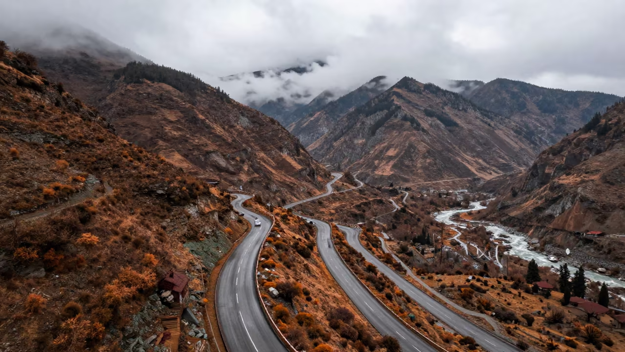 Autumn Mountain Switchback Road Manali in far above river meanders near Manali