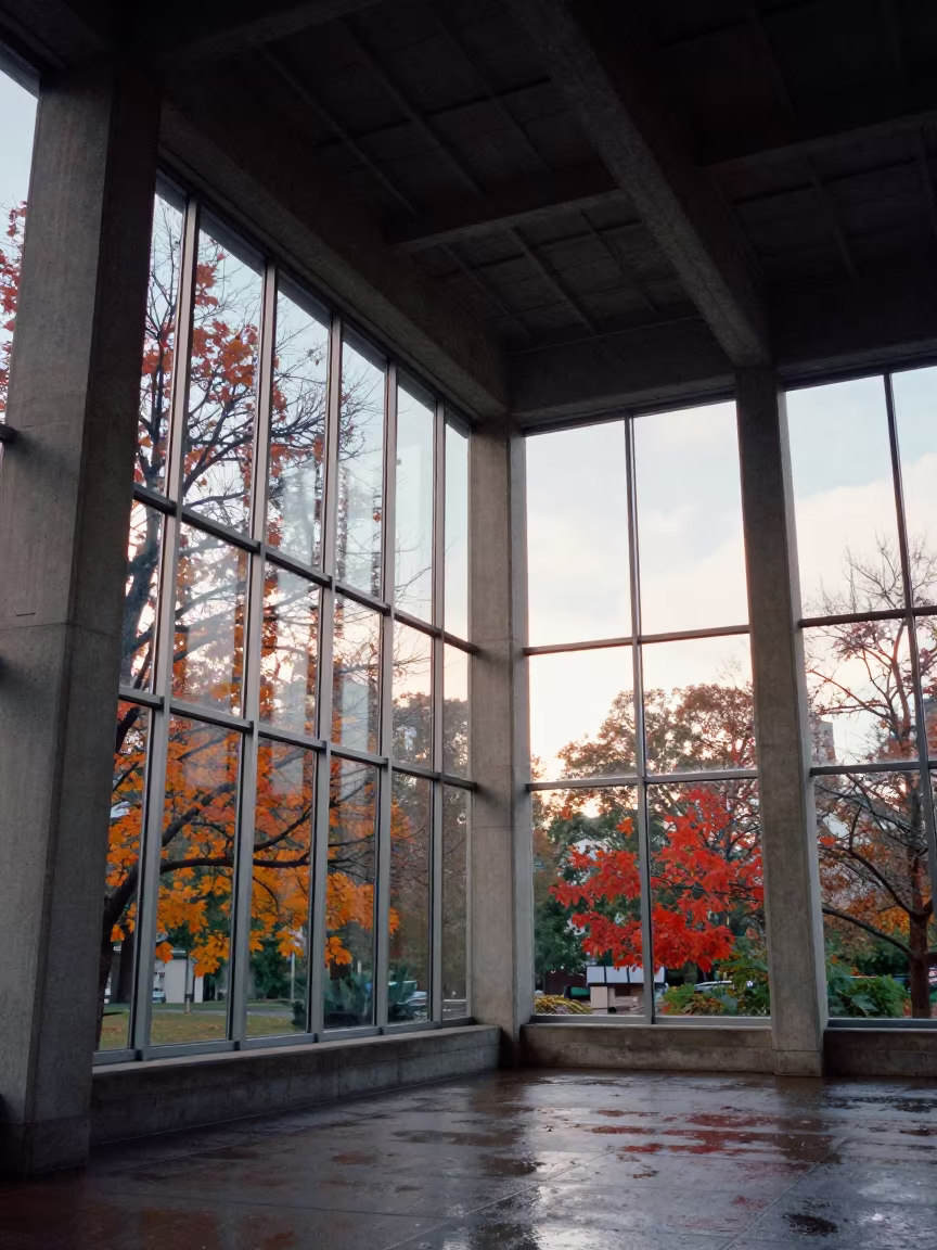 Autumn Reflections in Glass Pavilions in inside a ribbed concrete lobby in St Louis