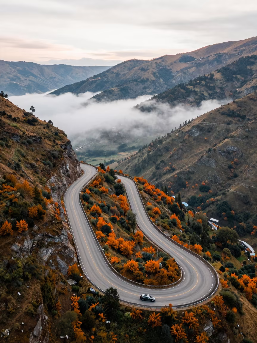 Autumn switchback road aerial view near Quito in near Quito
