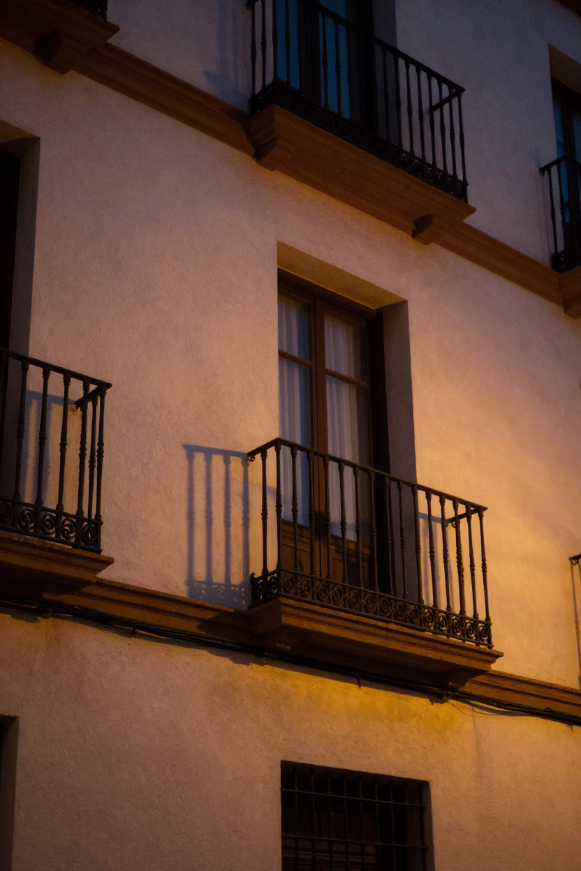 Balcony Shadows in Seville at As City Lights Begin To Glow in in Seville, Spain