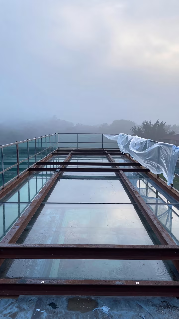 Bali Glazing Deck at Dawn Wet Season Mist in on an active construction deck in Bali
