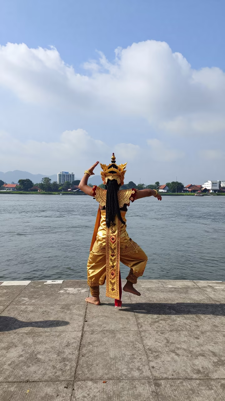 Balinese Legong Dancer Gold Costume Riverside Jakarta in near a riverside landing in Jakarta
