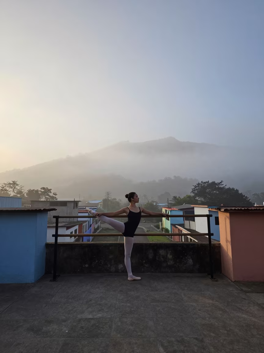 Ballerina Stretches Among Tiny Shoebox Buildings in in San Fernando de Apure