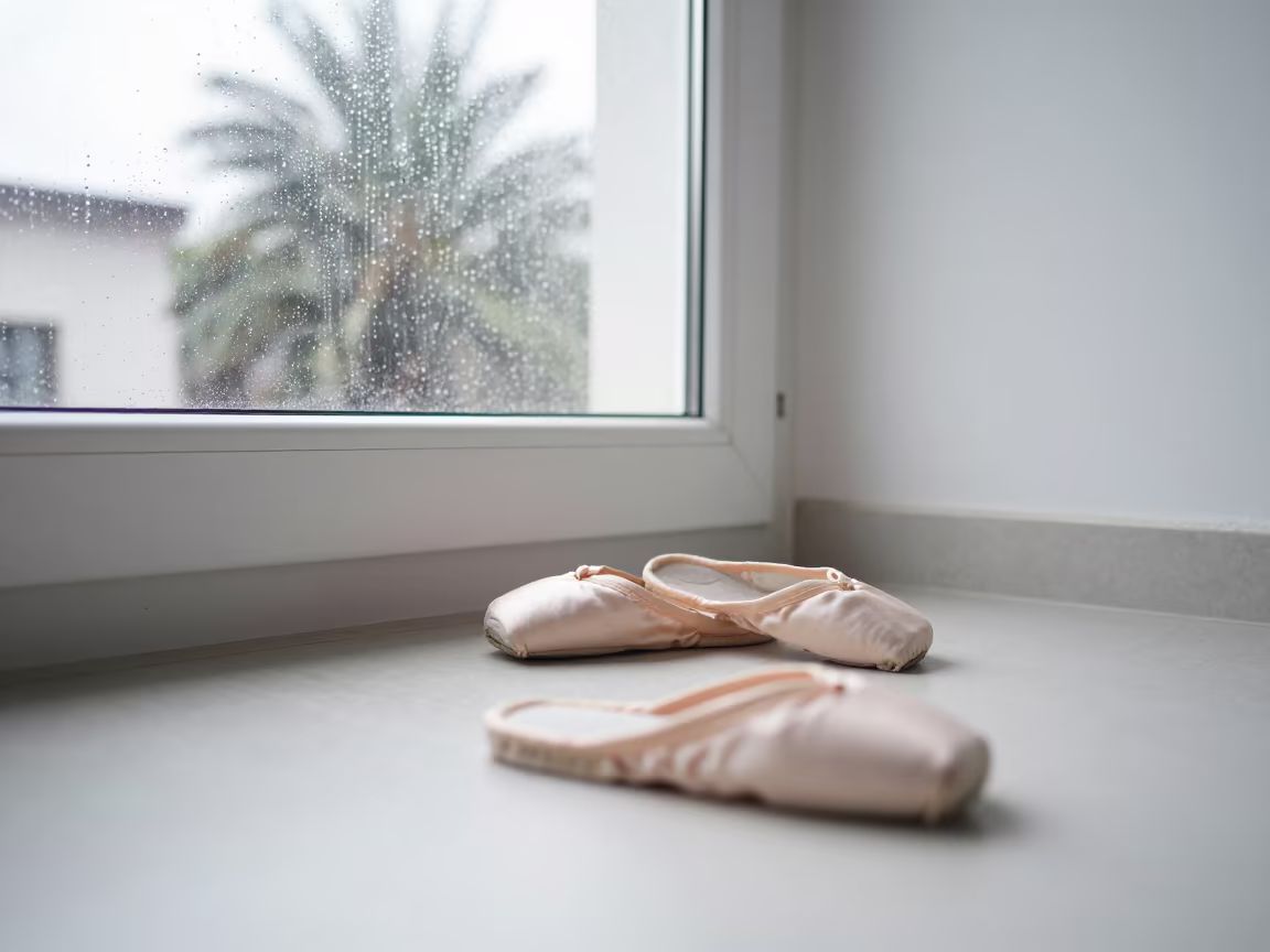Ballet Slippers by Rain Window Lashkar Gah in beside a rain-streaked window near Lashkar Gah