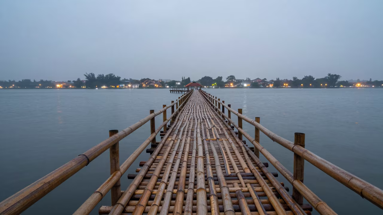 Bamboo Bridge Over Water in Early Evening Fog in near Makati, Manila