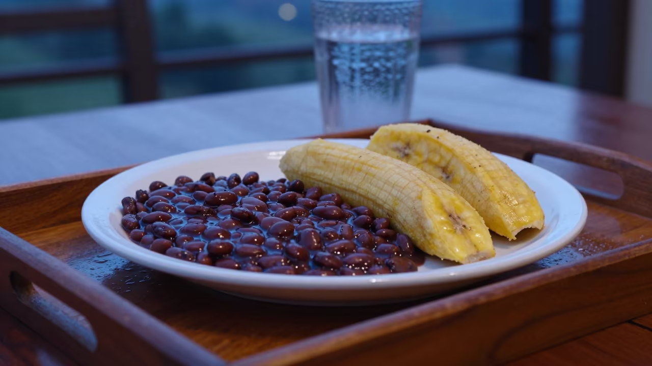 Bandeja Paisa Plate with Beans and Plantain in on a tea house tray in Kampala