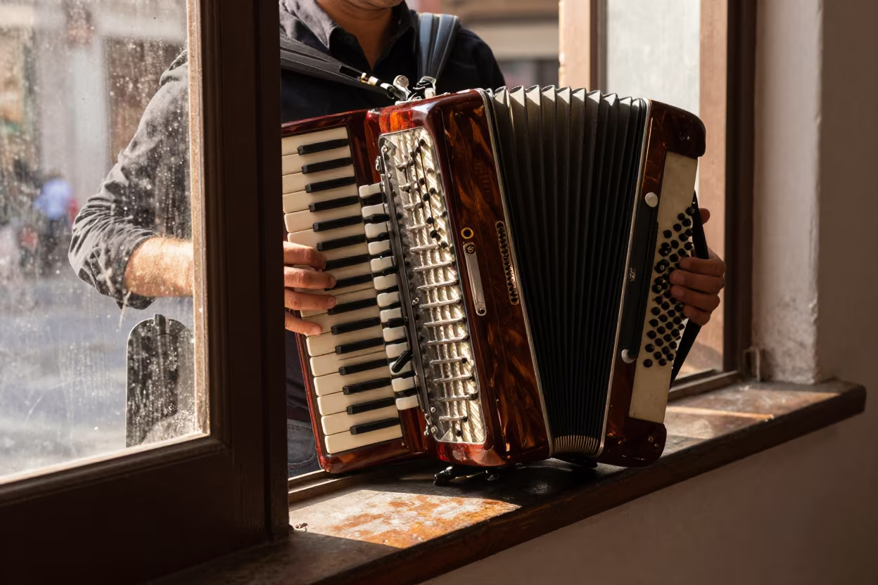 Bandoneon Player Squeezing Tangos in Buenos Aires in on a painted display ledge near Villa Crespo, Buenos Aires