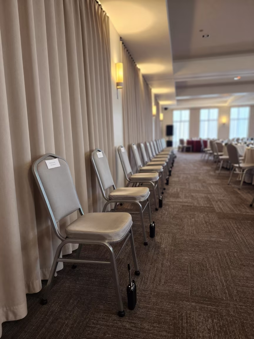 Banquet Hall Setup Corridor with Nested Chairs in inside a banquet hall before service near Bendigo