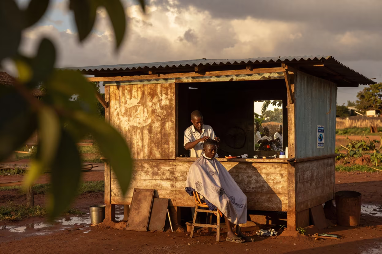 Barber Cutting Hair in Mzuzu Wet Season in in Mzuzu