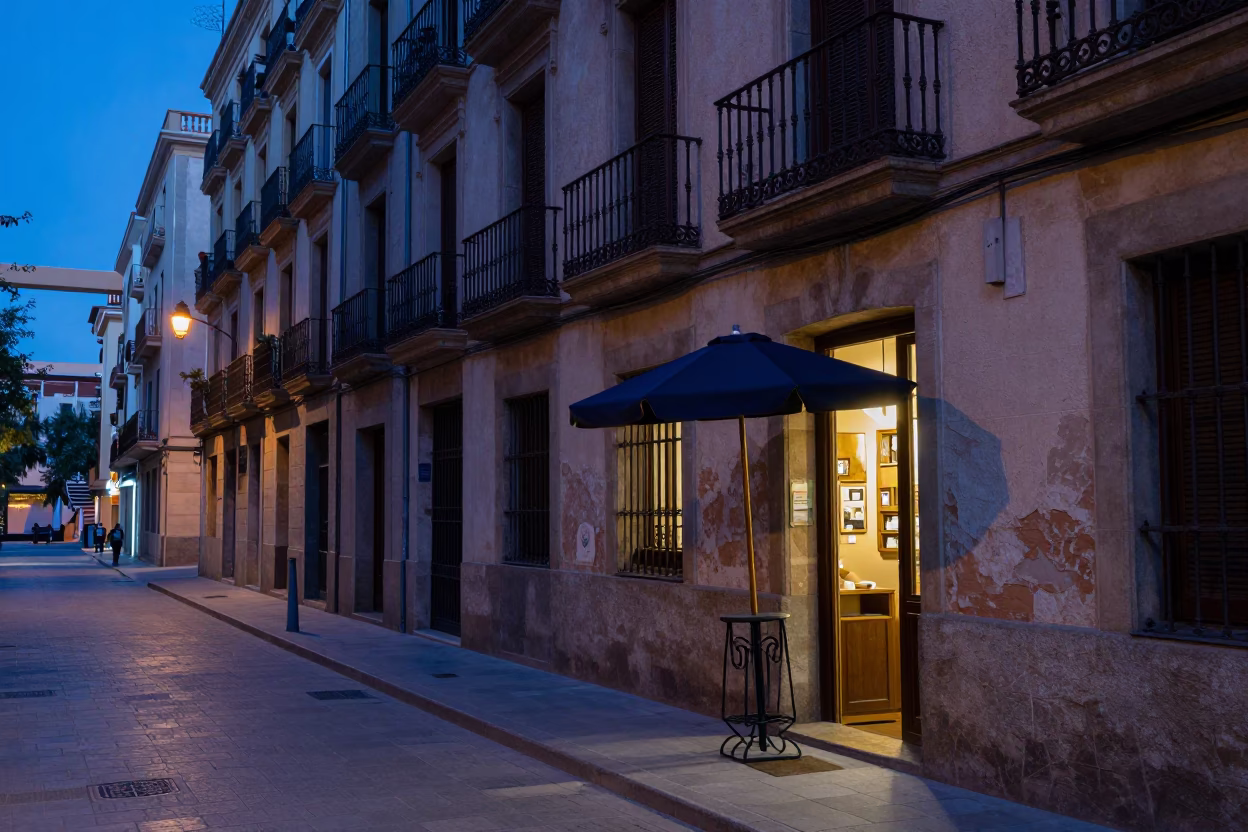 Barcelona Spain Twilight Street Scene with Umbrella Stand and Glass Doorframe in in Barcelona, Spain