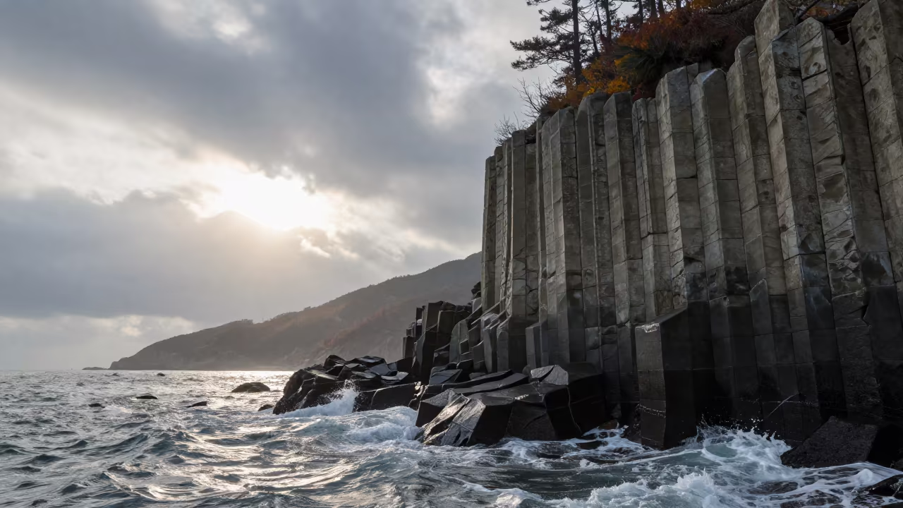 Basalt Column Wall on Busan Ridge Morning in from a ridge above layered foothills near Busan