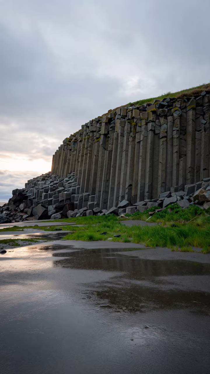 Basalt Columns Standing Against Evening Floodplain in across a floodplain after rain in British Columbia