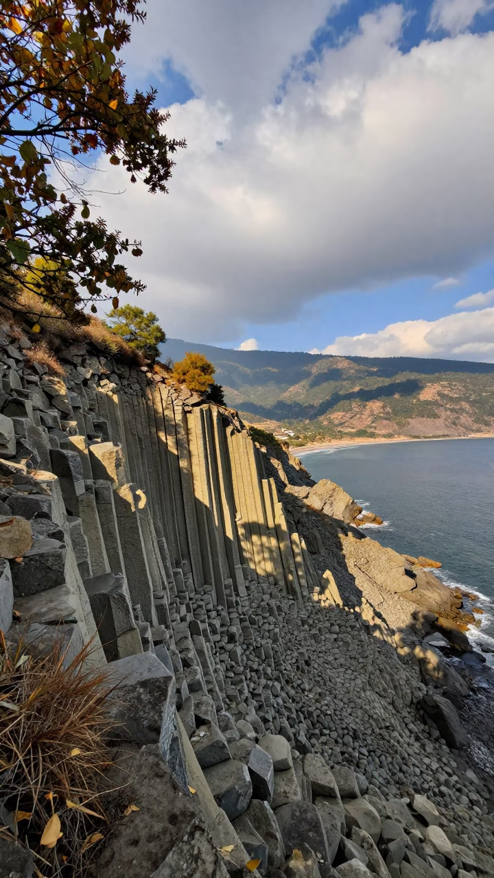 Basalt Columns on Thimphu Ridge in Late Afternoon in from a ridge above layered foothills near Thimphu