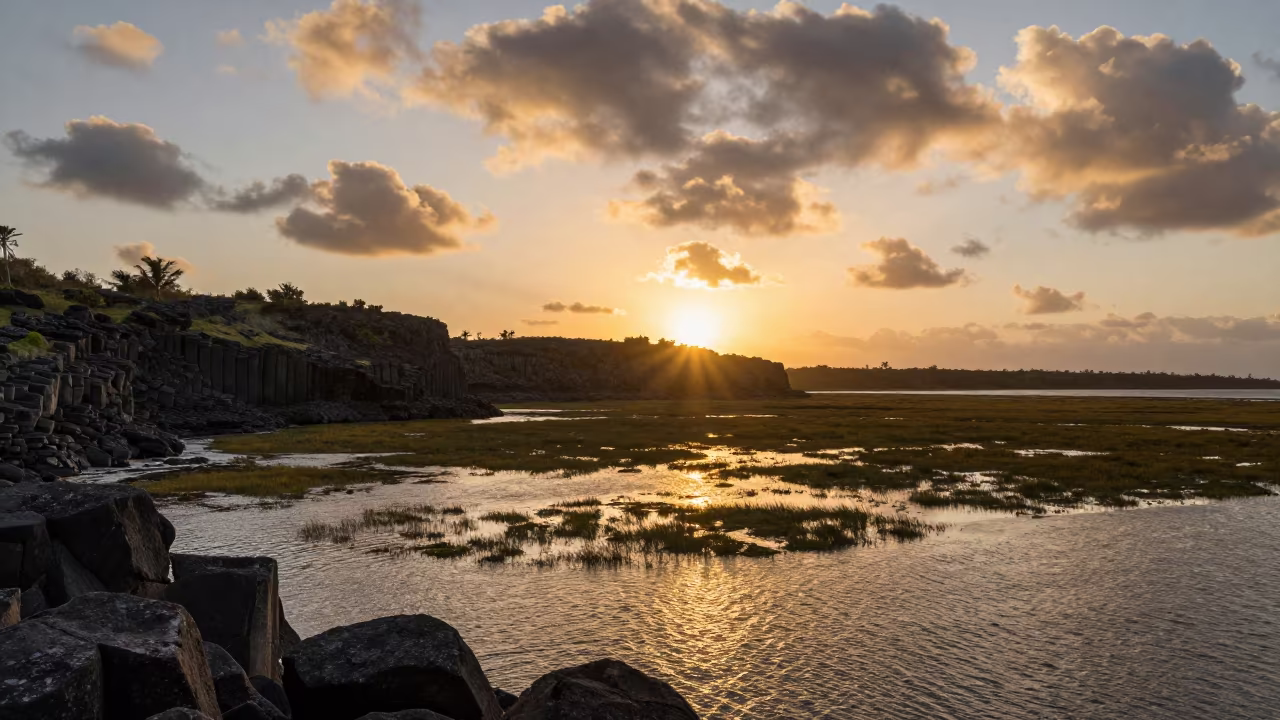 Basalt Headland Silhouette Flooded Zanzibar Meadow in across a wide valley floor near Zanzibar
