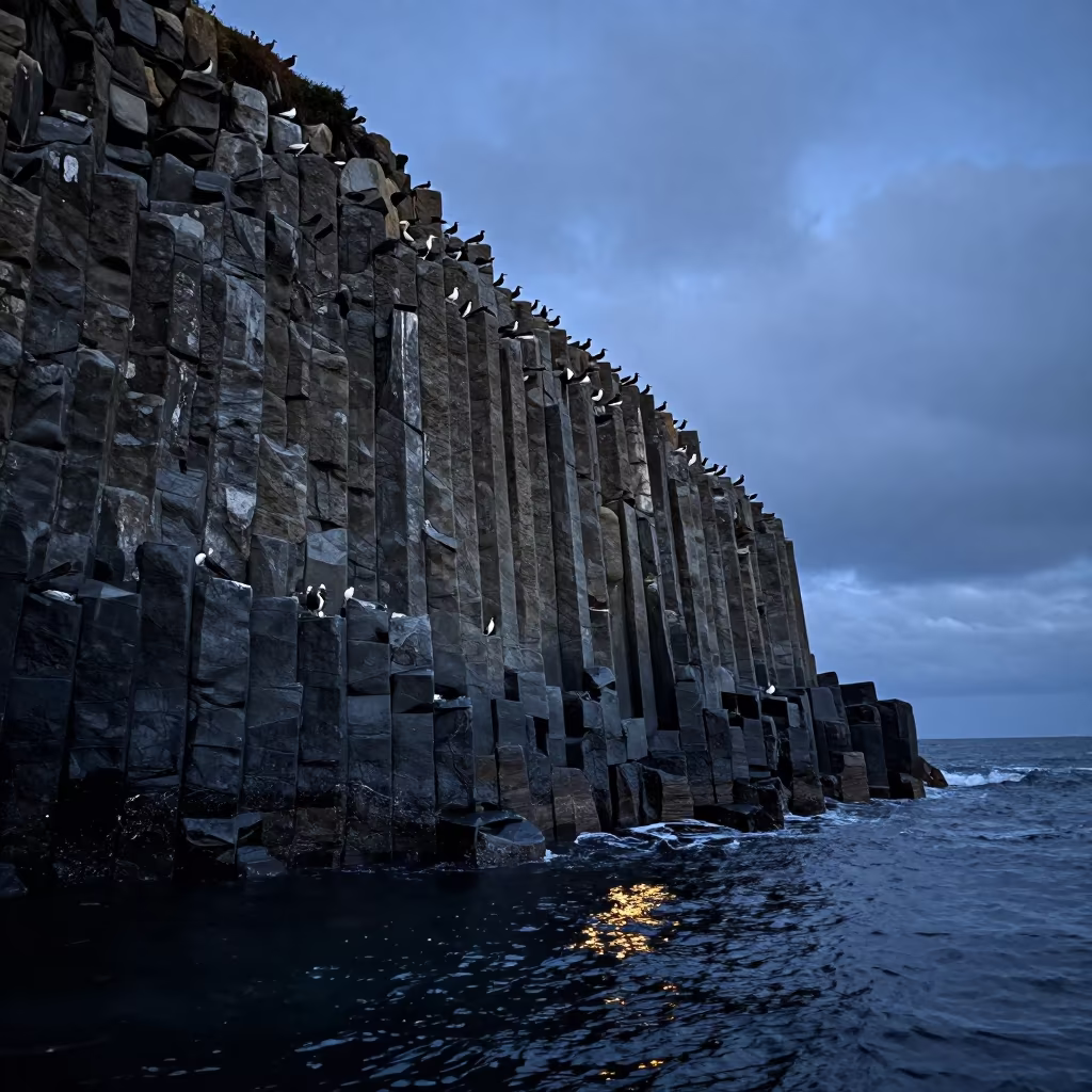 Basalt Sea Stack Under Evening Blue Light in across a wide valley floor near Mombasa