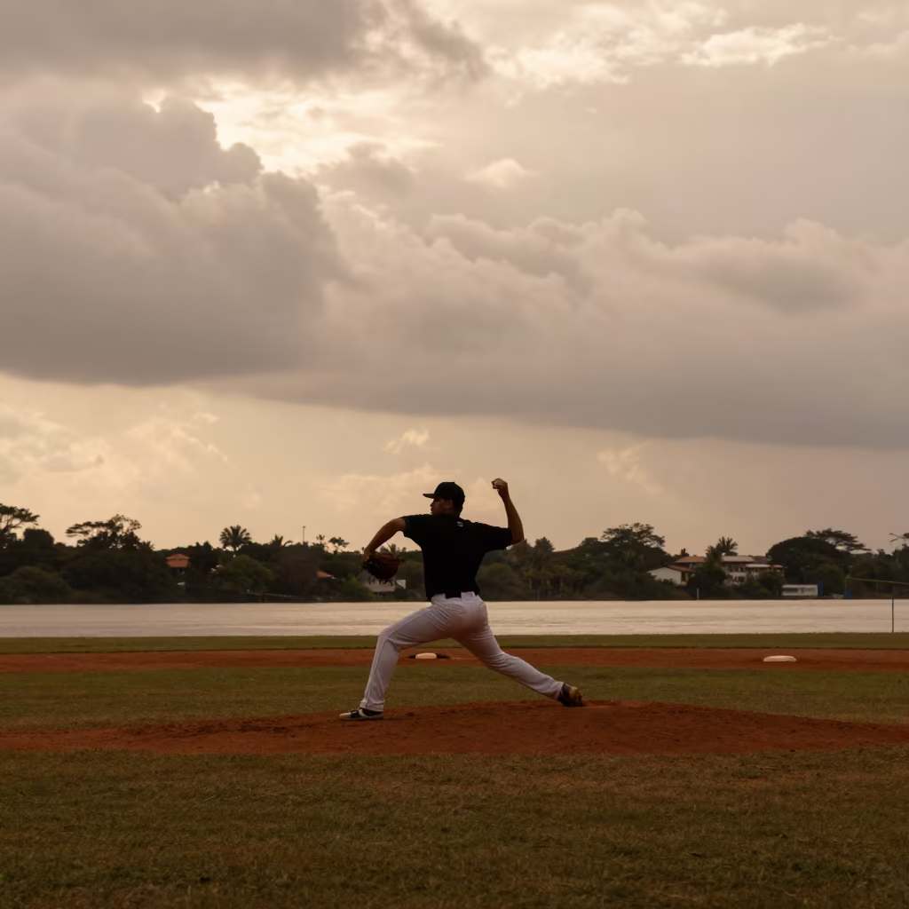 Baseball Pitcher Silhouette Riverbank Dusk in by a riverbank near Ciudad Bolívar