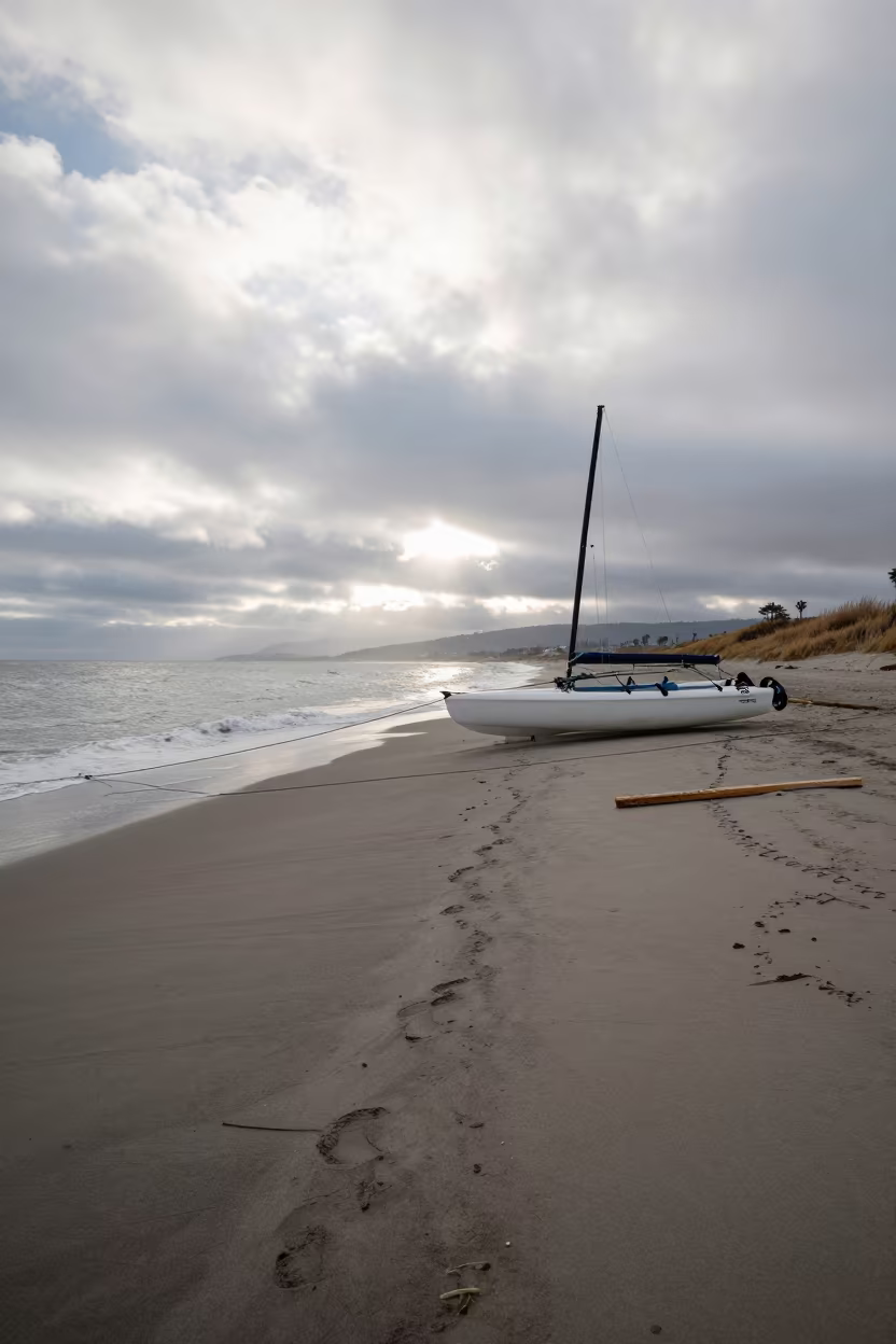 Beached Catamaran on California Winter Shore in in California