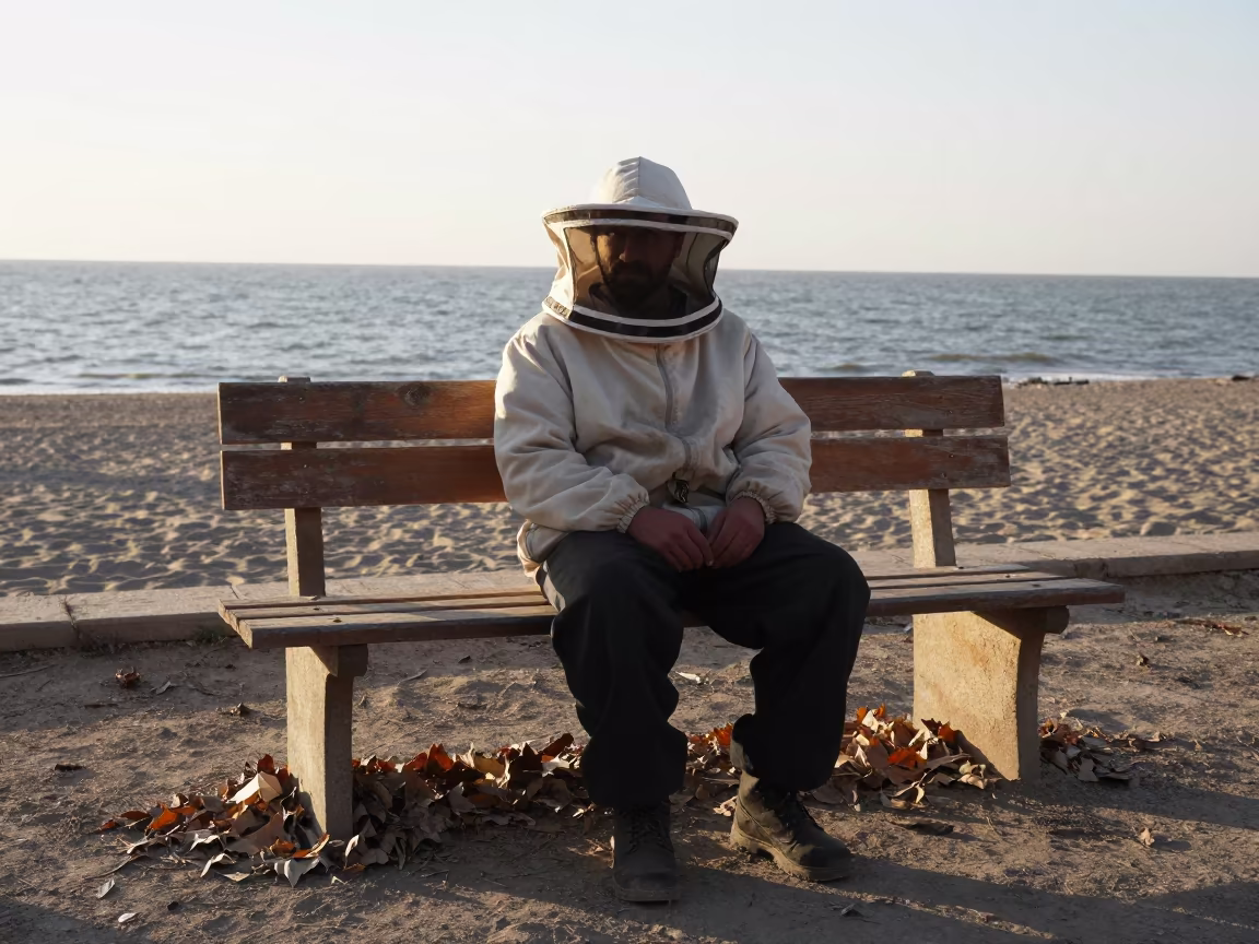 Beekeeper in Shadow at Dawn Near Beach Mashhad in along a beach near Mashhad