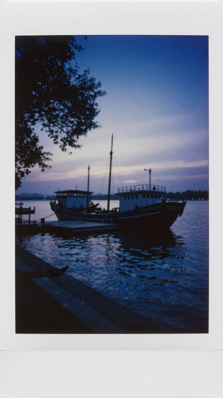 Beijing China Indigo Twilight Junk Boat Harbor Scene with Tree in in Beijing, China