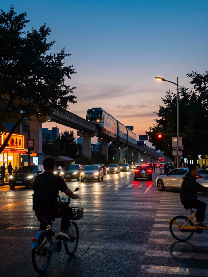 Beijing Twilight Street Scene with Monorail and Bicycle Traffic in in Beijing, China