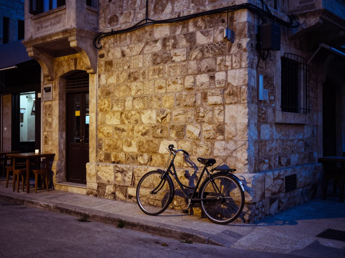 Beirut Evening Street Scene with Bicycle and Stone Wall Under Blue Hour Light in in Beirut, Lebanon