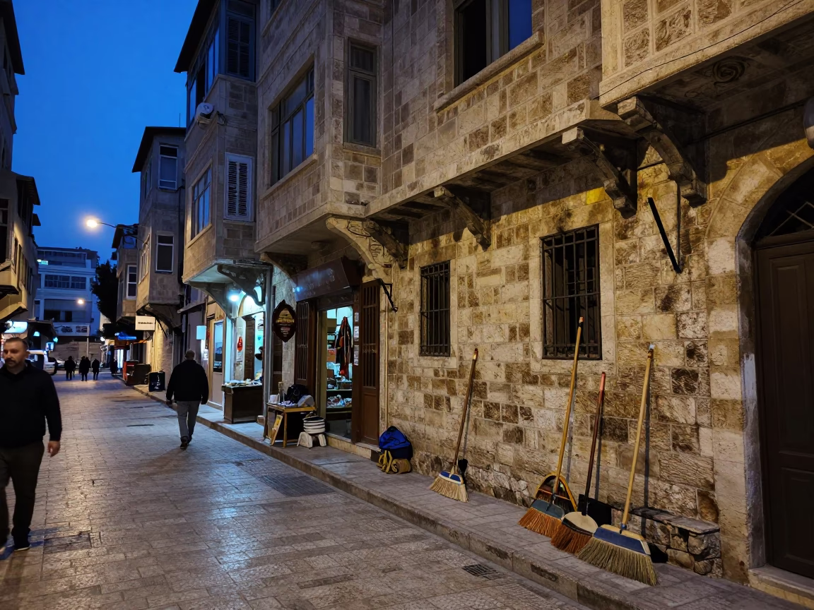 Beirut Lebanon Evening Street Scene with Brooms and Local Shop Facade in in Beirut, Lebanon