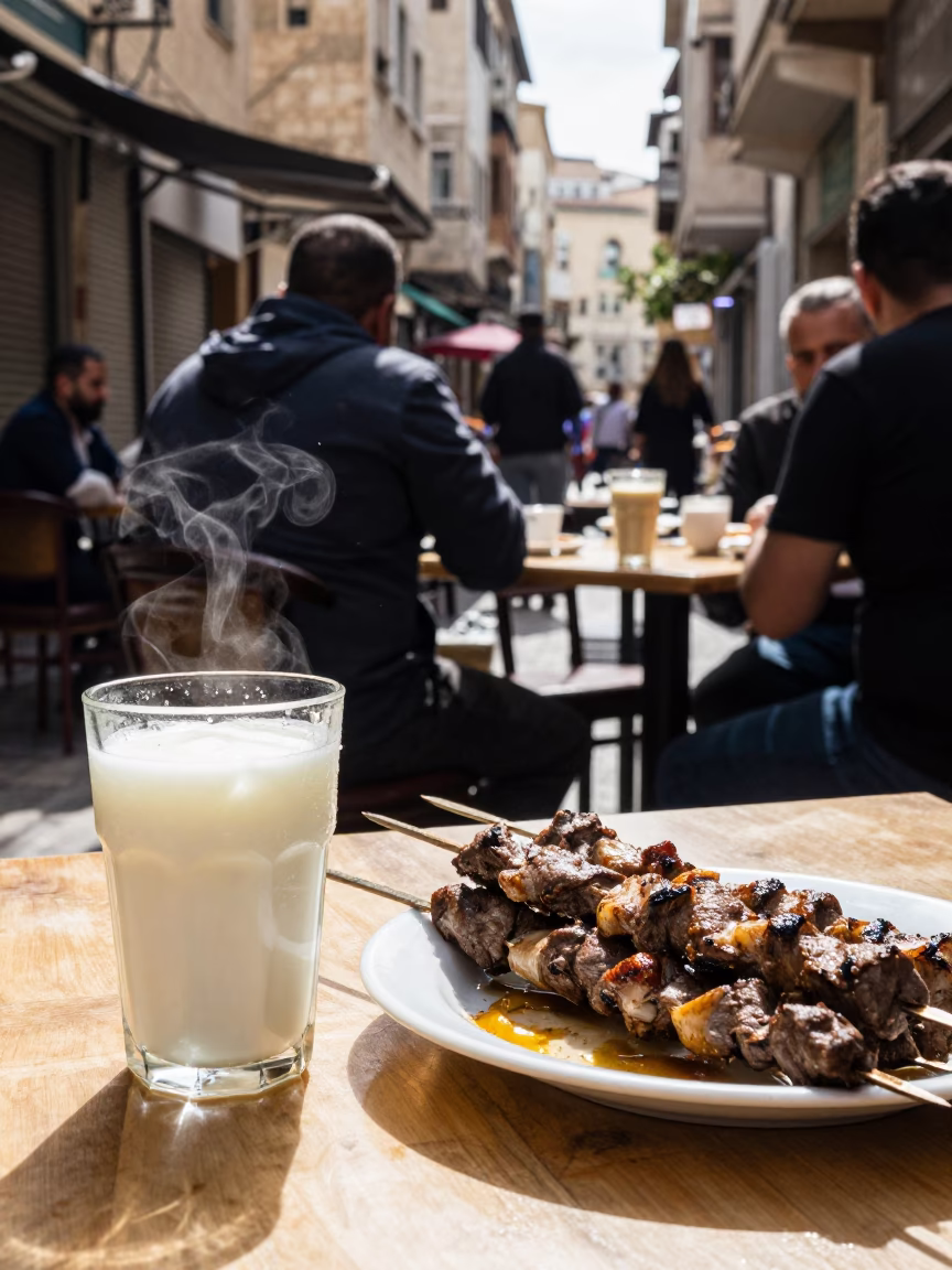 Beirut Street Cafe Scene with Ayran and Kebab in Bright Midmorning Light in in Beirut, Lebanon