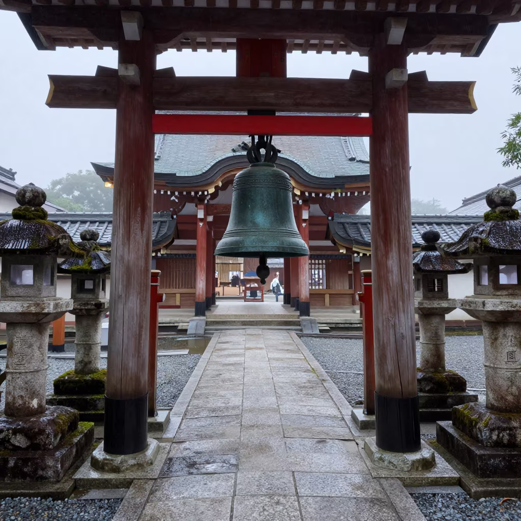 Bell Ringing at Shinto Shrine Entrance Dawn in in a cloister garden in Osaka