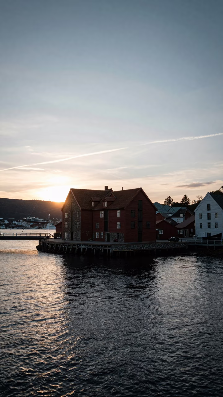 Bergen Norway Drawbridge Counterweight House Over Black Tidal Channel at Sunset in in Bergen, Norway