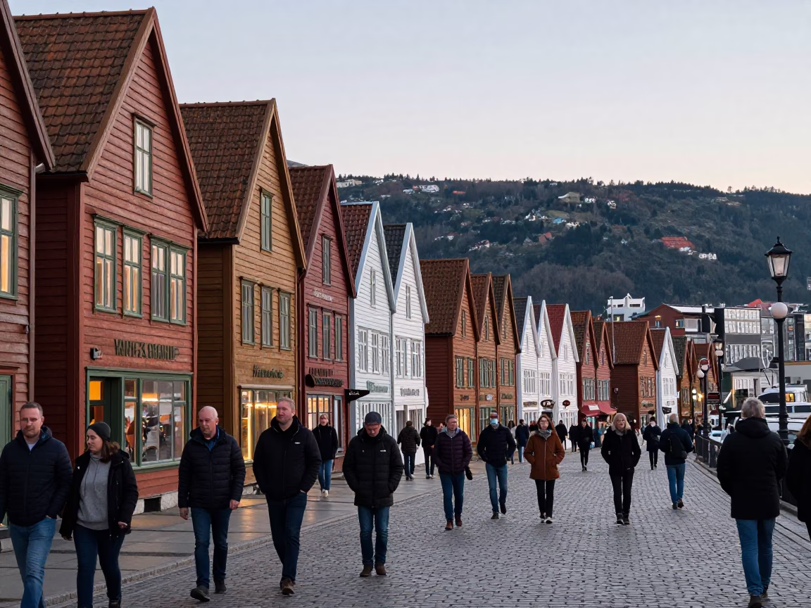 Bergen Norway Early Evening Bryggen Wharf Busy Street Scene with Wooden Houses in in Bergen, Norway