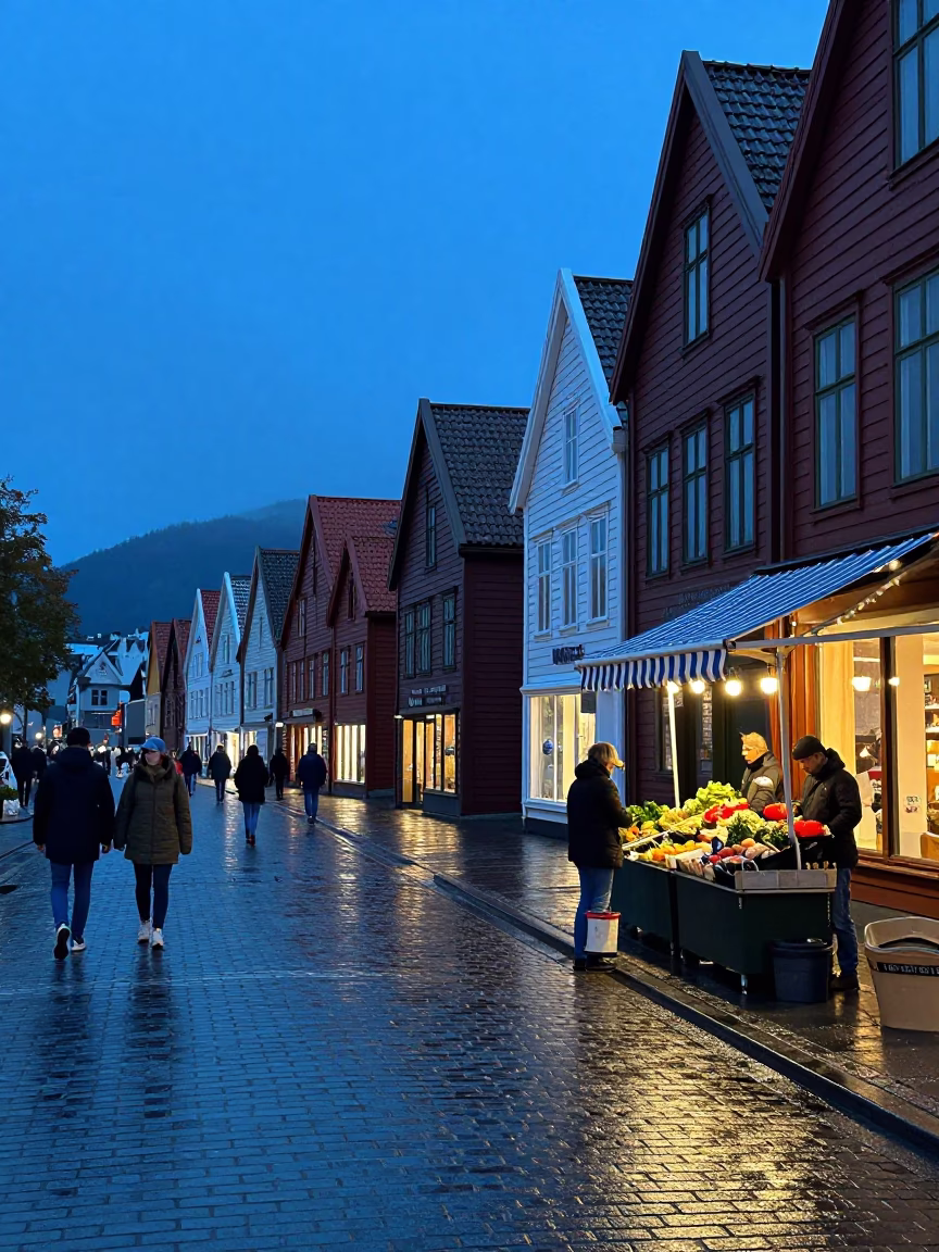 Bergen Norway Evening Blue Light Street Scene with Local Commerce and Umbrellas in in Bergen, Norway