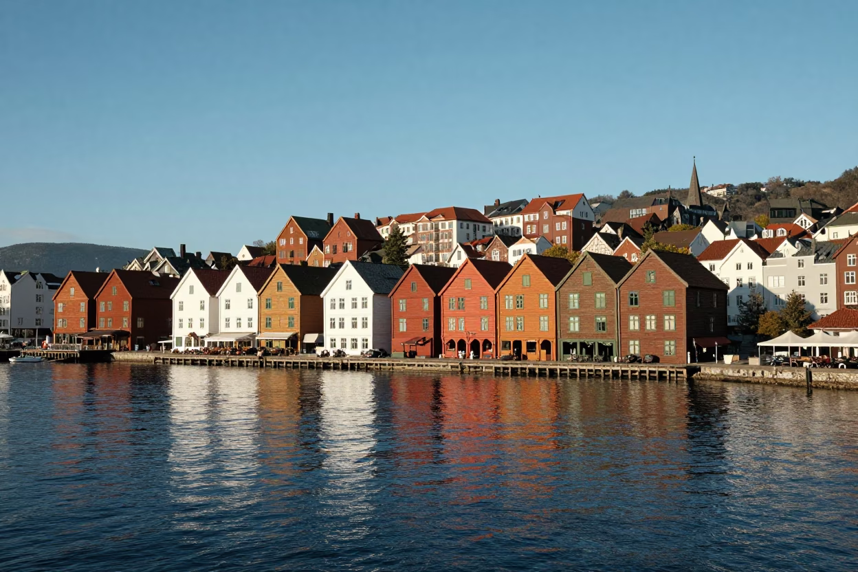 Bergen Norway Harbor Panorama with Bryggen Wharf and Fjord Water in Late Afternoon Light in in Bergen, Norway