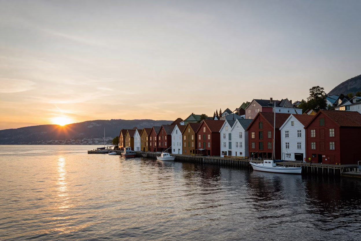 Bergen Norway Harbor Sunset with Colorful Wharf Houses and Boats in in Bergen, Norway