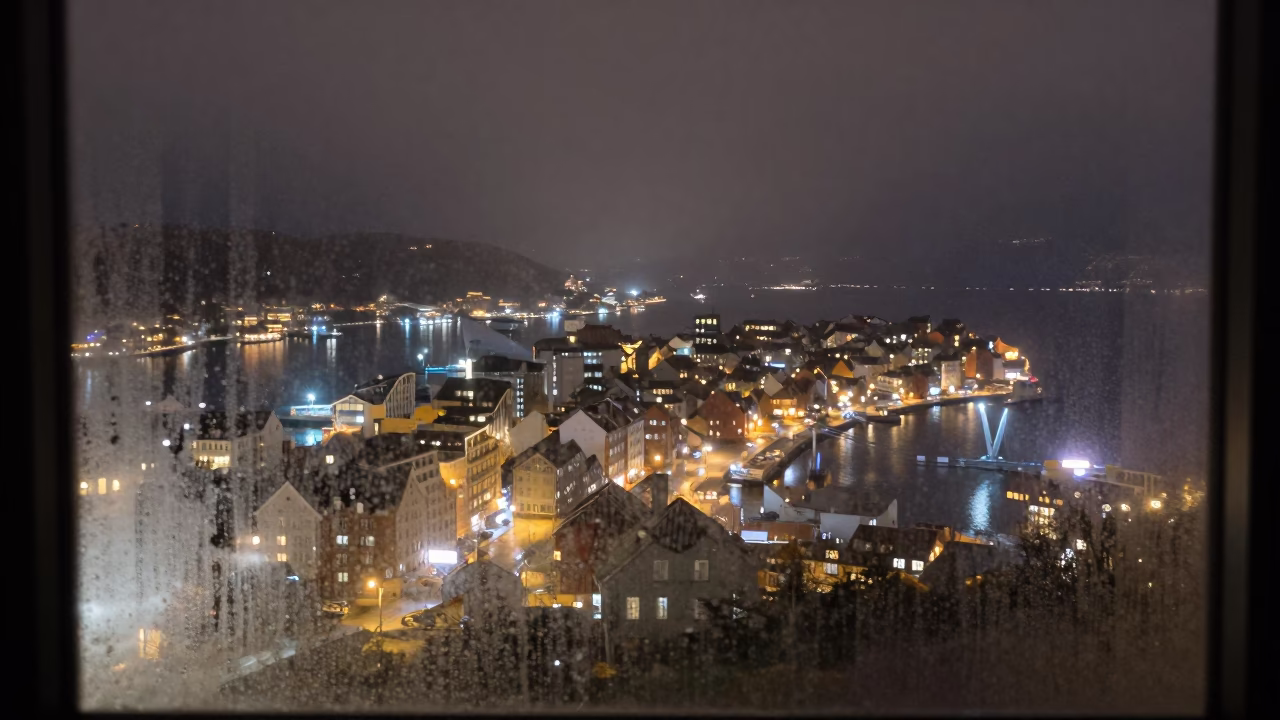 Bergen Norway Night Landscape Fogged Window View of Harbor and Mountains in in Bergen, Norway