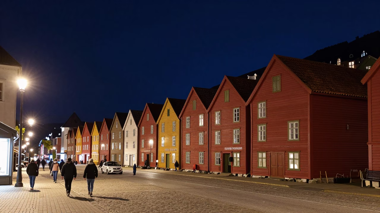 Bergen Norway Night Street Scene with Red Hanseatic Wharf Houses and Steamship in Harbor in in Bergen, Norway