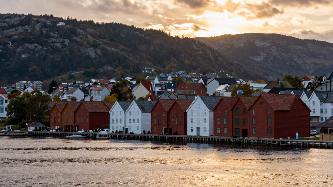 Bergen Norway Sunset View Over Bryghan Wharf and Harbor Water in in Bergen, Norway