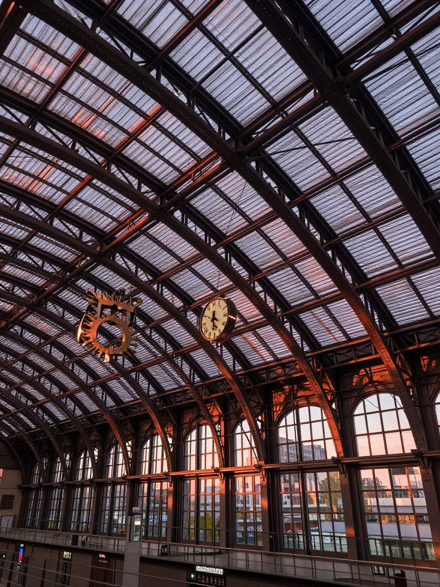Berlin Germany Dusk View of Hauptbahnhof Iron Roof and Clock Tower with Copper Light in in Berlin, Germany